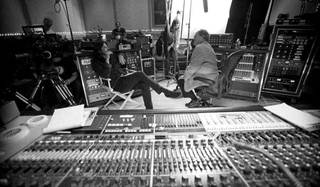 Sound City's famous analog Neve mixing board...oh, yeah, and Dave Grohl in the back. / Photo courtesy of Roswell Studios.