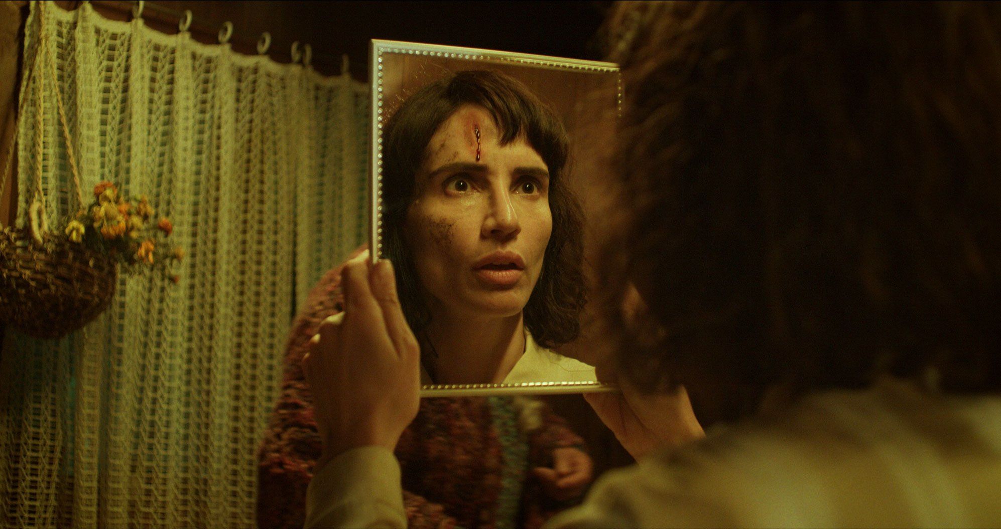 Through the mirror, darkly: Leonor Varela faces the uncanny in *The Cow Who Sang A Song Into The Future* / Photo by Inti Briones, courtesy of Kino Lorber.