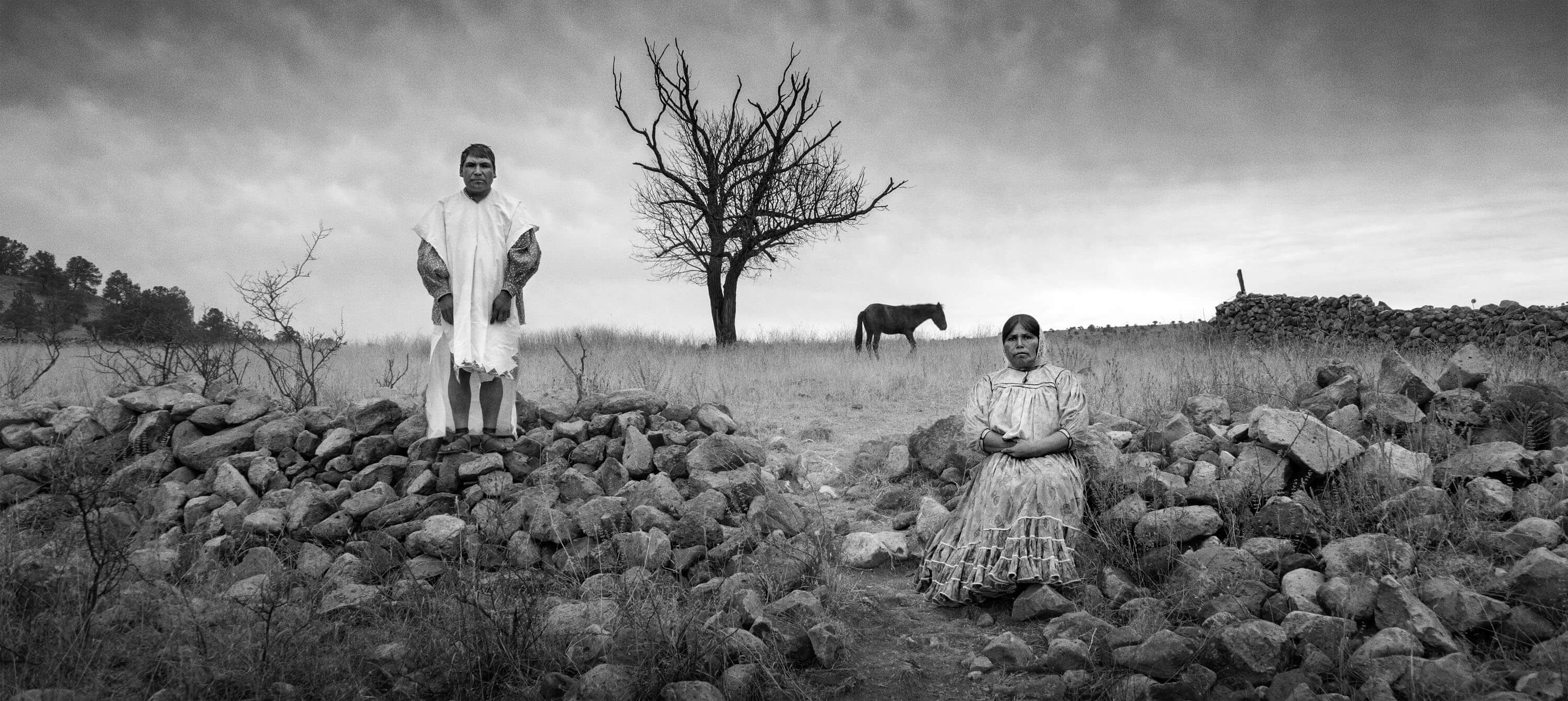 Portraits of survival: a couple gazes at the camera in "Gods of Mexico" / Photo courtesy of Oscilloscope Labs.