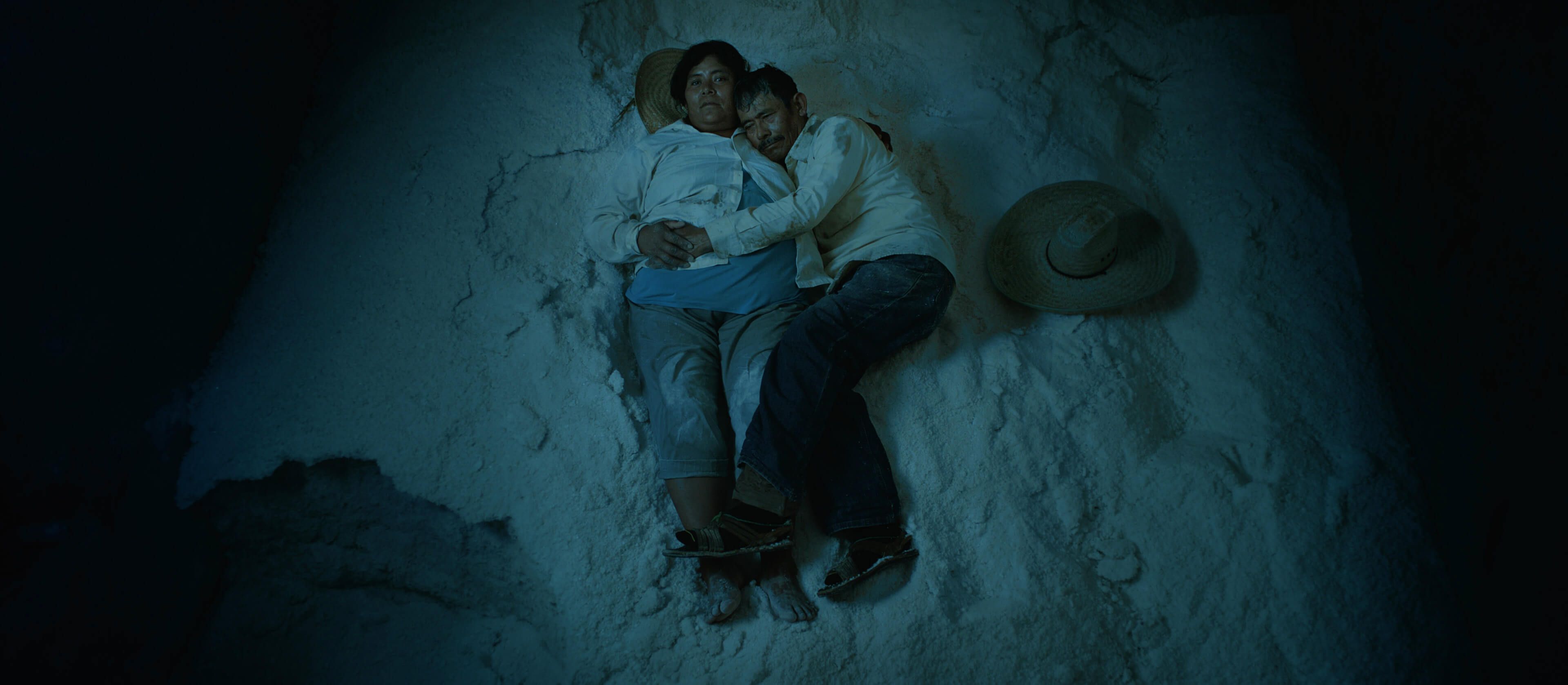 The human and the divine: a couple takes a break in "Gods of Mexico"  / Photo courtesy of Oscilloscope Labs.