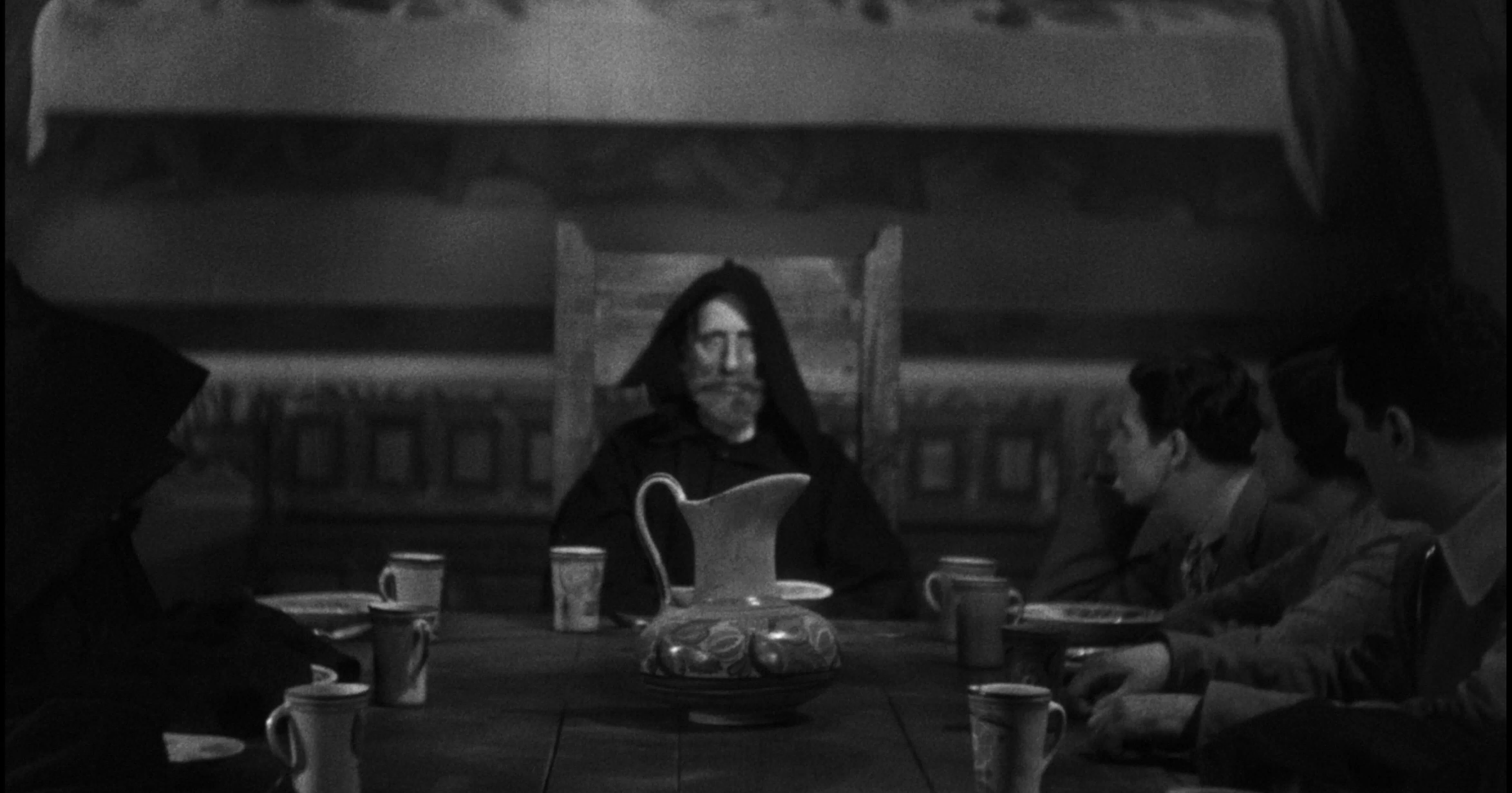 Paco Martínez heads the table in The Phantom of the Monastery -Credit: Powerhouse Films